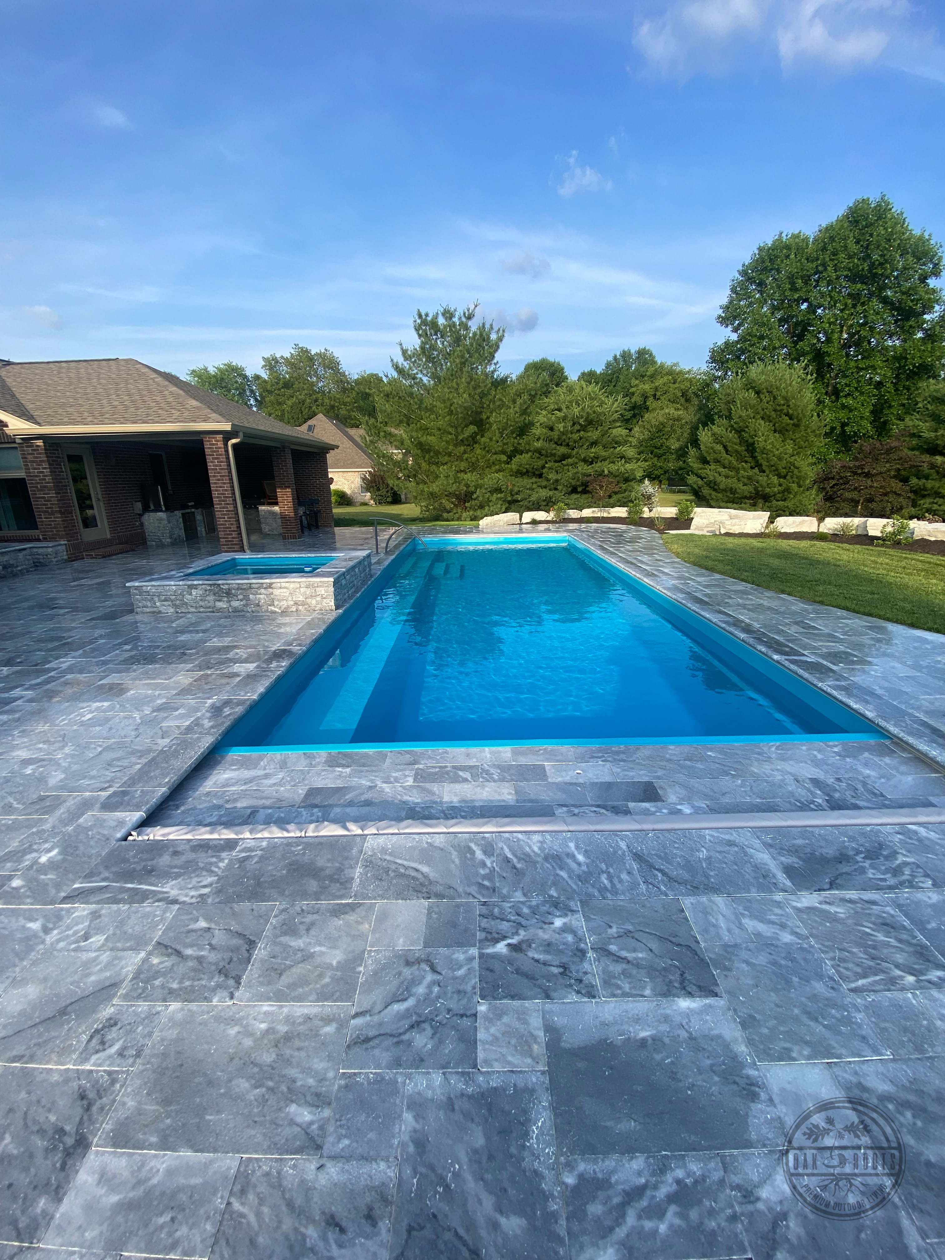 Pool and outdoor living space by Oak Roots LLC Milan Indiana